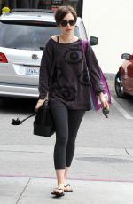 LILY COLLINS Out Shopping in Los Angeles 05/06/2015
