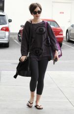 LILY COLLINS Out Shopping in Los Angeles 05/06/2015