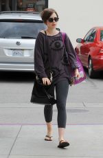 LILY COLLINS Out Shopping in Los Angeles 05/06/2015