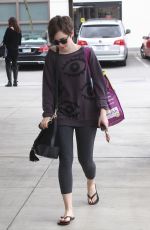 LILY COLLINS Out Shopping in Los Angeles 05/06/2015