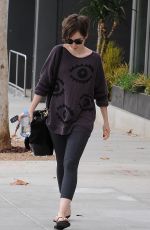 LILY COLLINS Out Shopping in Los Angeles 05/06/2015