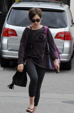 LILY COLLINS Out Shopping in Los Angeles 05/06/2015