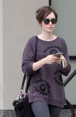 LILY COLLINS Out Shopping in Los Angeles 05/06/2015