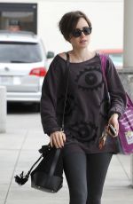 LILY COLLINS Out Shopping in Los Angeles 05/06/2015