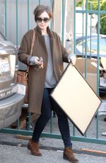 LILY COLLINS Out Shopping in Los Angeles 05/15/2015