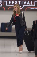 LILY JAMES Arrives Airport in Adelaide