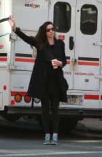 LIV TYLER Hailing for Taxi in New York