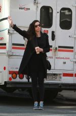LIV TYLER Hailing for Taxi in New York
