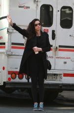 LIV TYLER Hailing for Taxi in New York