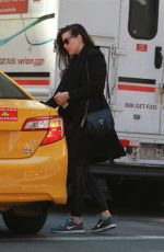 LIV TYLER Hailing for Taxi in New York