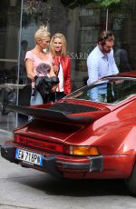 MICHELLE HUNZIKER and Tomaso Trussardi Drive Their Porsche Out in Milan