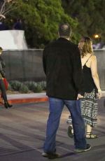 MILA KUNIS Arrives at U2 Concert in Inglewood