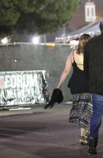 MILA KUNIS Arrives at U2 Concert in Inglewood