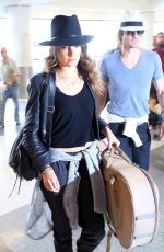 NIKKI REED Arrives at Los Angeles International Airport 05/19/2015