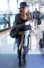 NIKKI REED Arrives at Los Angeles International Airport 05/19/2015