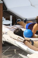 NIKKI REED at a Pool in Rio De Janeiro