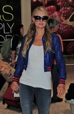 PARIS HILTON at Heathrow Airport in London 05/12/2015