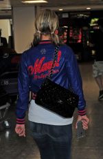 PARIS HILTON at Heathrow Airport in London 05/12/2015