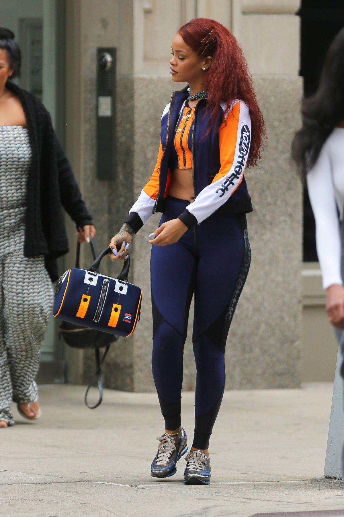 RIHANNA in Tights Leaves Her Appartment in New York 05/13/2015.
