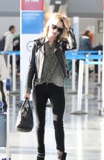 ROSIE HUNTINGTON-WHITELEY at JFK Airport in New York 05/03/2015