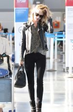 ROSIE HUNTINGTON-WHITELEY at JFK Airport in New York 05/03/2015