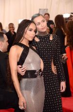 ZOE KRAVITZ and MILEY CYRUS at MET Gala 2015 in New York