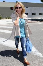 ALOISE MUMFORD Leaves a Clothing Store in Beverly Hills