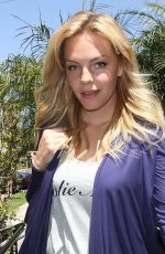 ALOISE MUMFORD Leaves a Clothing Store in Beverly Hills