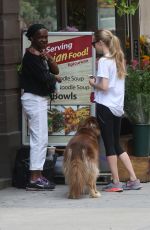 AMANDA SEYFRIED and Finn Out and About in New York 06/26/2015