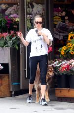 AMANDA SEYFRIED and Finn Out and About in New York 06/26/2015