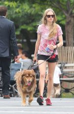 AMANDA SEYFRIED Walks Her Dog Finn Out in New York 06/16/2015