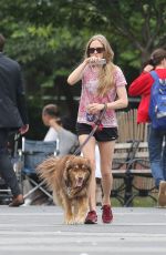 AMANDA SEYFRIED Walks Her Dog Finn Out in New York 06/16/2015