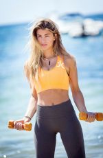 AMY WILLERTON in Tights Working Out at a Beach in Ibiza 06/23/2015