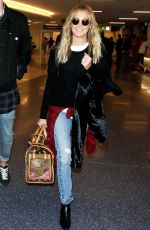 ASHLEY TISDALE Arrives at LAX Airport in Los Angeles 06/16/2015