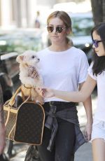 ASHLEY TISDALE With Her Dog Out in Soho 06/13/2015