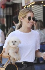 ASHLEY TISDALE With Her Dog Out in Soho 06/13/2015