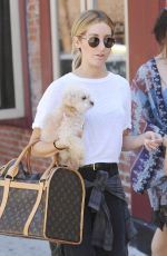 ASHLEY TISDALE With Her Dog Out in Soho 06/13/2015