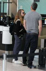 CARA DELEVINGNE at Heatrow Airport in London 06/29/2015