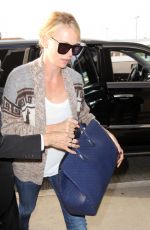 CHARLIZE THERON Arrives at LAX Airport in Los Angeles 06/07/2015