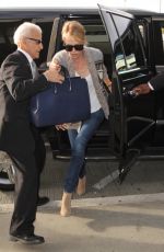 CHARLIZE THERON Arrives at LAX Airport in Los Angeles 06/07/2015