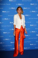 CHRISSY TEIGEN at dailymail.com Seriously Popular Yacht Party in Cannes