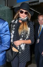 CHRISSY TEIGEN at Los Angeles International Airport 06/28/2015