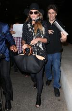 CHRISSY TEIGEN at Los Angeles International Airport 06/28/2015