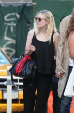 DAKOTA FANNING and Jamie Strachan Out and Aboutin New York 06/06/2015