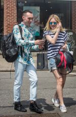 DAKOTA FANNING in Jeans Shorts Out in New York 06/17/2015