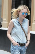 DAKOTA FANNING in Jeans Shorts Out in Soho 06/23/2015