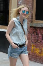DAKOTA FANNING in Jeans Shorts Out in Soho 06/23/2015