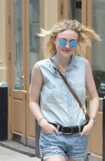 DAKOTA FANNING in Jeans Shorts Out in Soho 06/23/2015