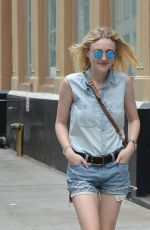 DAKOTA FANNING in Jeans Shorts Out in Soho 06/23/2015