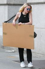 DAKOTA FANNING in Tank Top Out in New York 06/26/2015